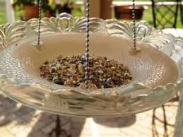 Repurpose A Vintage Glass Ceiling Light Cover As A Bird Feeder Glass Bird Feeders Glass Light Fixture Garden Art Projects