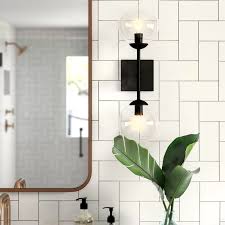 Vanity lights are essential to bathrooms for many reasons. Marianna 2 Light Dimmable Black Armed Sconce In 2021 Wall Lights Sconces Globe Chandelier