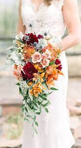 Whatever reason you choose to send summer flowers, the recipient will surely be delighted as their senses are treated to the beauty and fragrance of incredible blooms like red, yellow, and orange lilies, dazzling gerbera daisies, and iconic. Fantastic Red Wedding Bouquets Orange Bridal Bouquet Fall Wedding Bouquets Summer Wedding Bouquets