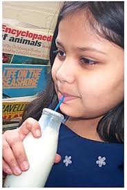 She thought he looked hungry so brought him a large glass of milk. Milk Wikipedia