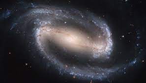 Nasa hubble image of galaxy ngc 2608 with edit from the adler . Barred Spiral Galaxy Ngc 2608 Surrounded By Many Many Other Galaxies Universe Today