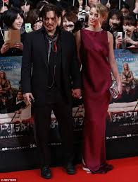 Since the film's premieres — and her many sizzling red carpet outings since. Johnny Depp Rocks An Oily Do On The Red Carpet As He Attends Tokyo Premiere Of Mortdecai With His Glamorous Fiancee Amber Heard Daily Mail Online