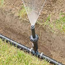 Fill in the trenches and the holes with dirt and sod. How To Install An Irrigation System Better Homes Gardens