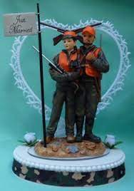 A simple wedding cake topper that makes a statement, the single letter (usually the couple's new shared last initial). Hobby Job Wedding Cake Topper Grooms Top Fun Hunting Wedding Cake Toppers Hunting Wedding Cake Wedding Cake Toppers