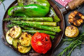 Maybe you would like to learn more about one of these? Grilled Green Vegetables Zucchini Asparagus Bell Pepper Garlic Sausages Lemon And Rosemary On Cast Iron Grill Pan Gray Slate Background Top View Stock Photo Picture And Royalty Free Image Image 68127053