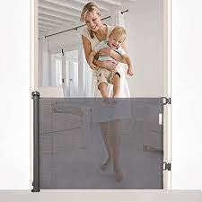Amazon Com Retractable Baby Gate Extra Wide Safety Baby Gate 34 Tall Extends To 59 Wide Mesh Safety Indoor Gate For Babies And Pets Pet Dog Gate For Doorways Stairs Hallways Indoor Outdoor Baby