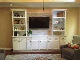 Custom Built Entertainment Center With Quartz Countertop And Stikwood Pal Custom Built Entertainment Centers Entertainment Center Built In Entertainment Center
