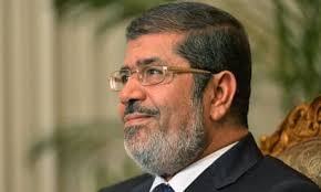 Mohamed Morsi bars court challenges and orders Hosni Mubarak retrial