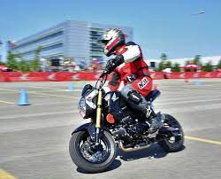 Rocking The Red Attacking A Gymkhana On A Honda Grommet Honda Honda S Bone Stock