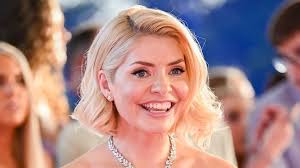 Holly Willoughby, 23, is unrecognisable with long auburn hair and thick  fringe