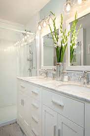 We'll walk you through how to add a double sink vanity to enhance your bathroom and up your home's resale value. Image Result For Double Sink Vanity Lighting Ideas Bathroom Mirror Design Bathroom Light Fixtures Bathrooms Remodel