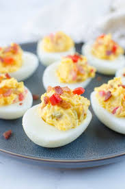 Bacon Pimento Cheese Deviled Eggs A Twist On The Classic Deviled Egg Filling Is Mixed With Crispy Bacon Cheddar Chees Deviled Eggs Recipe Deviled Eggs Food