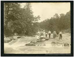 Postcard photograph of the flood damage along cabin creek including the railroad tracks in the background. History Friends Of Deckers Creek