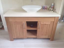Tile counters in the kitchen and bathrooms with oak trim. Oak Bathroom Vanity Unit Bespoke Kitchens Furniture By Mario Panayi