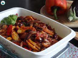 Stewed eggplant with peppers, tomatoes and olives. Caponata Mista Ricetta Con Patate Peperoni E Melanzane