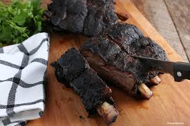 After the ribs have been on the smoker for 1 hour, give them a light misting of the liquid. How To Smoke Beef Ribs Delicious Traditional Bbq Favorite