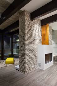 The main home offers two bedrooms with an upstairs master suite. Modern Concrete Block House With Wooden Patio Attached