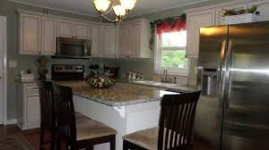 Sanibel White Cabinets By Sunnywood Available At Surplus Warehouse D Kitchen Remodel Kitchen Kitchen Cabinets