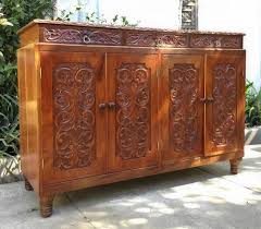 The dining cabinet is built from solid hardwood and features unique wrought iron hardware. S A L E Classic Multi Purpose Cabinet Can Be Buffet Console Sideboard Long Table Altar Table Etc Narra Body With Beautiful Carved Details 54 Length 37 3 4 Height