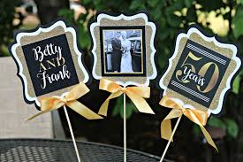 Since gold is the official 50th wedding anniversary color, you should choose gold as your primary color and pair it with another color to complement your decorations. Golden Anniversary 50th Anniversary Party Decorations Etsy