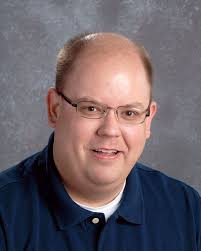 Teacher reporter' enjoys view — and sports photos — from behind the net