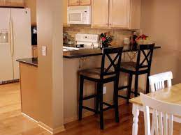 Single table top and rack of absolutely identical color looks very impressive. How To Create A Raised Bar In Your Kitchen How Tos Diy