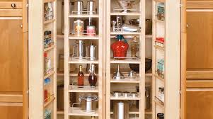 The two shelves on the left side are 10 inches wide, 6.75 inches deep, and have 12 inches of vertical space. Wood Swing Out Pantry
