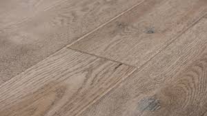 100% waterproof, fire retardant, micro bevel edges, and no transitions needed within 90 feet. Oak Stone City Kentwood Flooring