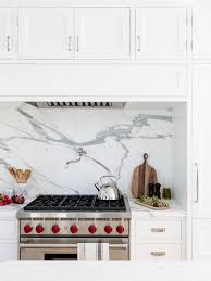 Stunning custom kitchen by superior woodcraft. Red Stove Knobs Design Ideas