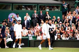 1 novak djokovic set to face russian cinderella story aslan karatsev in australian open semis. Djokovic And Federer Serve Up An All Time Classic At Wimbledon