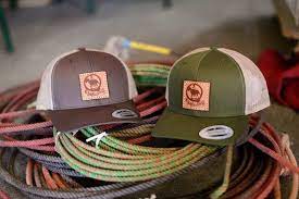 12 Custom Yupoong 6606 Retro Trucker Leather Patch Hats Etsy In 2021 Leather Patches Company Logo Leather