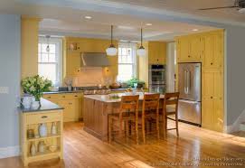Awesome Yellow Country Kitchens Design The Good Room Is The Workhorse Space Of Your Hous Yellow Kitchen Cabinets Country Kitchen Designs Yellow Kitchen Walls