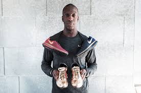 Michael johnson worn and dual signed nike gold shoe are on display during a press preview of the olympic collection at sotheby's on july 21, 2021 in new york city. Nike Pays Tribute To Former Olympian Michael Johnson Weartesters