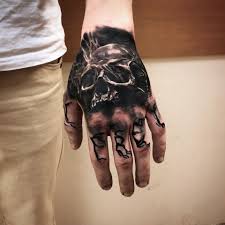 Some body art is cute or funny, and then some are cool or scary options. Skull Hand Tattoo On Black Skin Novocom Top