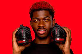 Lil nas x has poked fun at the controversy that erupted in march over his limited edition satan shoes by putting himself on trial in a video promoting his newest single. Nike Sues Designer Of Lil Nas X Satan Shoes Rolling Stone