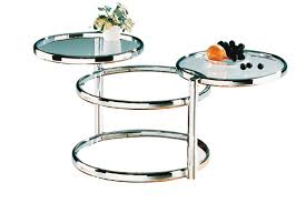 Add fun coffee table books to keep your guests entertained. Ottawa Glass Coffee Table In Chrome With Swivel Motion Mysmallspace Uk