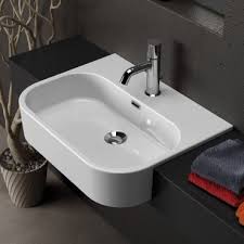 The gap semi recessed basin is uniquely designed to perfectly balance square and round shapes and lines, so it can be easily adapted to any bathroom or bathroom tend. Semi Recessed Washbasin Synthesis Olympia Ceramica