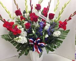 Stunning Tribute For An Uncle Who Served Our Country Designed By Pamela E Smith Roadrunner Flor Funeral Flowers Funeral Flower Arrangements Flowers Delivered