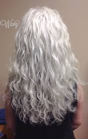 For the fun and sassy woman over the age of 50 who prefers to embrace herself as she is at the moment without letting go of her personality, curls and waves to a light blonde hair color seem like the right thing, with the. Beautiful Long Wavy Gray Hair Long Silver Wavy Hair Going Gray Gracefully Aging Gracefully Aginggraceful Long Hair Styles Long Gray Hair Grey Curly Hair