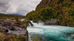 Maybe you would like to learn more about one of these? River Petrohue Waterfalls With Rock Formations And Osorno Volcano In Background Chile Windows 10 Spotlight Images