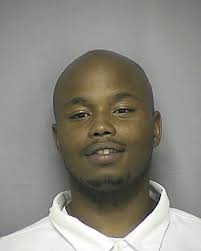 Suspect in custody after Lawrence couple confronts burglar