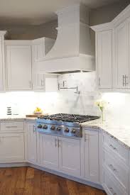 White Shaker Cabinets Decorative Range Hood Inset Cabinet Trendy Kitchen Backsplash Kitchen Layout Kitchen Design