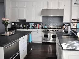Contemporary kitchen with black cabinets, marble counter backsplash and chandelier. Marble Kitchen Countertop Options Kitchen Designs Choose Kitchen Layouts Re Kitchen Countertop Choices Diy Kitchen Countertops Kitchen Countertop Options