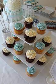 Because they are often cute and delicate and delicious and if you are lucky, quite unique. I Do Invitations By Michelle Blue White Baby Boy Shower Baby Shower Cupcakes Baby Shower Cakes Baby Boy Shower