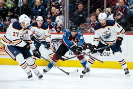 Adam larsson #6 of the edmonton oilers checks tanner pearson #70 of the vancouver canucks during their nhl game at rogers arena on may 4, 2021 in vancouver, british columbia, canada. E3xca4iu1zhvmm