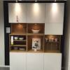 I got a bid from a custom cabinet builder which was going to be $2000 for cabinet boxes and doors (without a top) so. 3