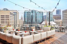 Rooftop bars are the place to be if you're planning to enjoy a summer's night out in chicago! The Best Rooftop Bars In Chicago