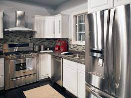 But for this industrial meets artsy space i can t imagine any other color. Appliances Cool Gray Kitchen With Stainless Steel Appliances Red Appliances Red Food Process Grey Kitchen Cabinets Red Small Kitchen Appliances Grey Kitchen