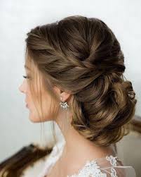 A New Twist On A Classic French Braid Perfect For Showing Off A Beautiful Open Back O Bridal Hair Updo Braided Hairstyles Updo Bride Hairstyles For Long Hair