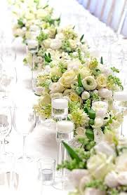 Pin By Theresa Hardy On Flowers Table Flower Arrangements Wedding Table Flowers White Wedding Flowers